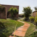 garden-maintenance-marrakech-irrigation-watering-hose-along-garden-path-66