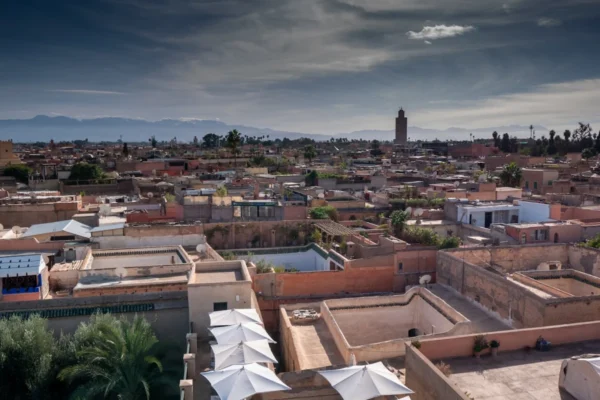 a view of a city with a clock tower in the distance