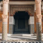 Ornate entryway with patterned tiles and columns